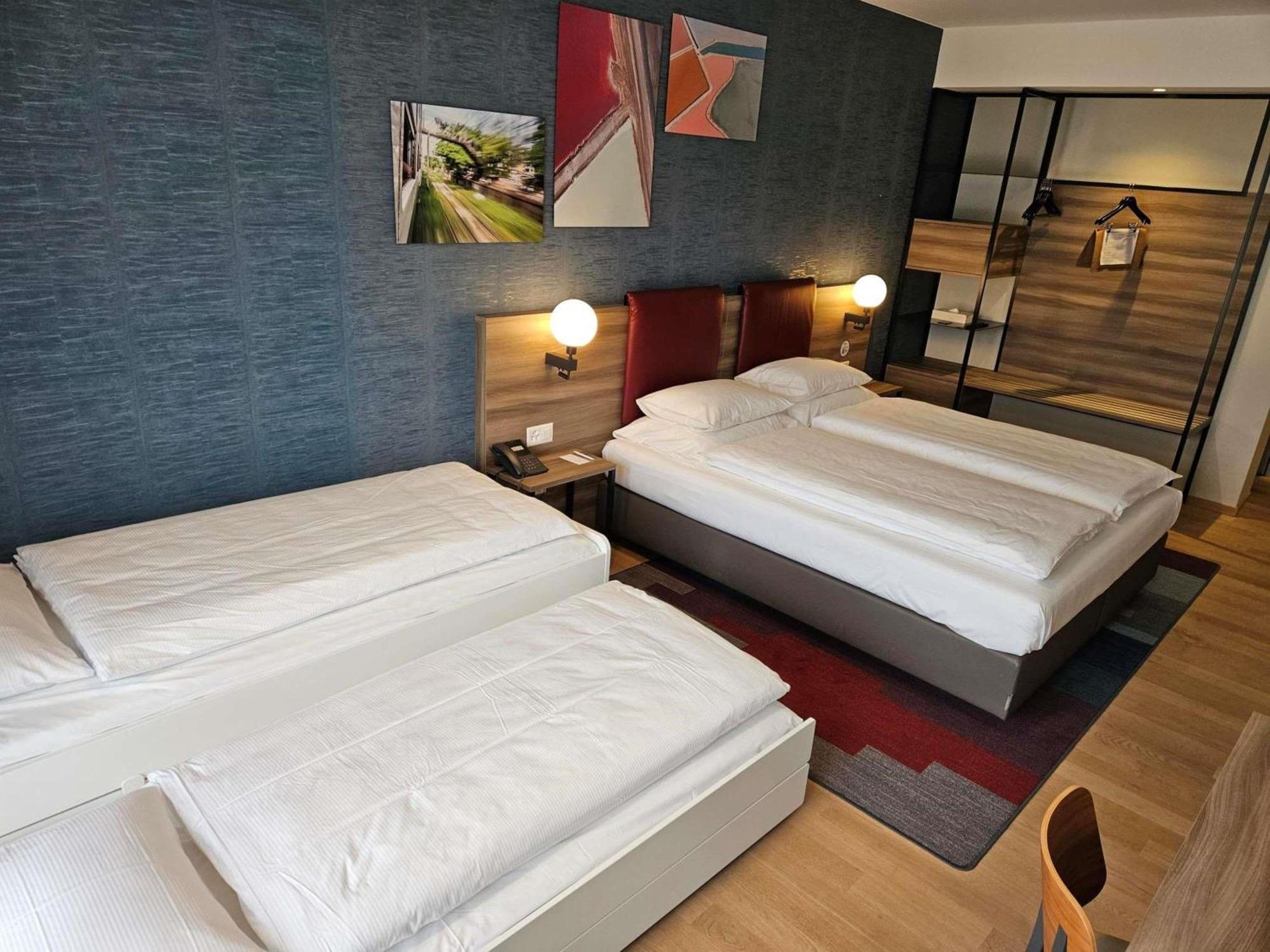 Family room with one double bed and one extra bed,1717184967:JPEG